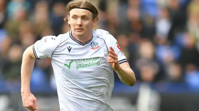 Jon Dadi Bodvarsson in action for Bolton Wanderers against Portsmouth in April 2024.