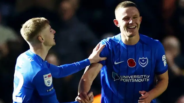 Colby Bishop celebrating his penalty in Portsmouth's win against Preston North End