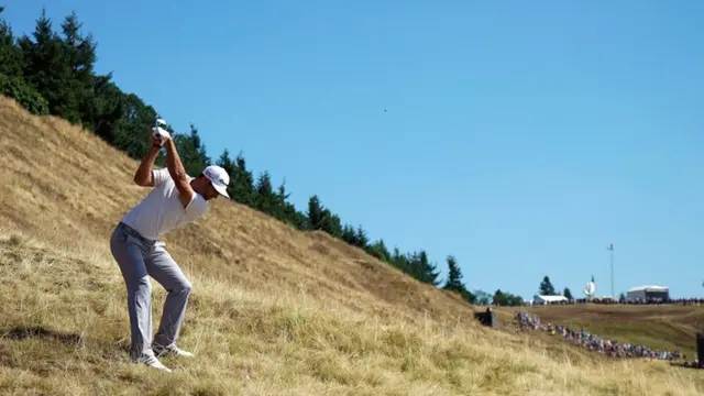 Dustin Johnson hits out of the rough