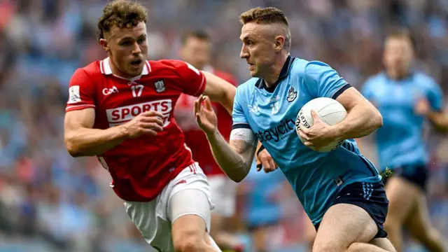 Paddy Small of Dublin in action against Neil Lordan of Cork 