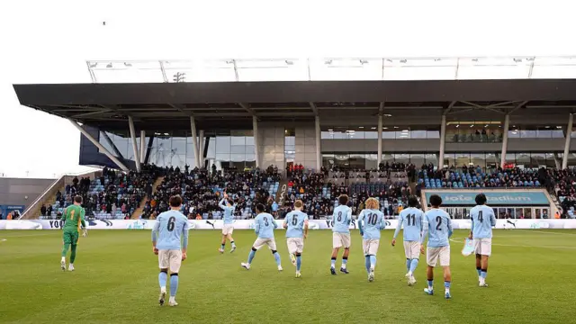 City players take their positions on the pitch prior to the FA Youth Cup Final against Manchester United at Joie Stadium