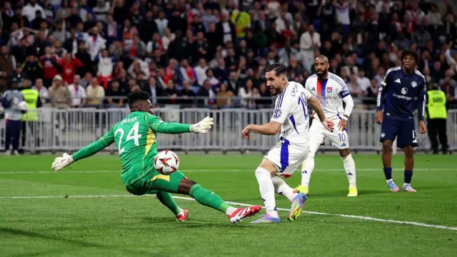 Rayan Cherki scores against Andre Onana