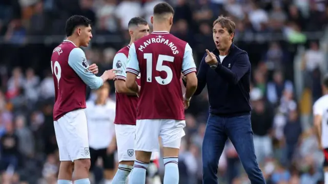 Julen Lopetegui gives instructions to his West Ham players during the game against Fulham