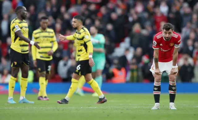 Watford players react at full-time after drawing with Manchester United