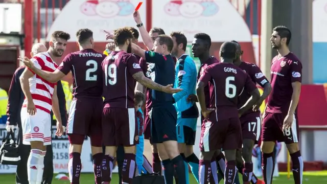 Willie Collum shows Hearts' Callum Paterson a red card against Hamilton