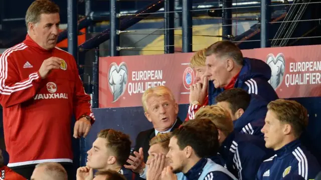 Scotland manager Gordon Strachan and his backroom team take in the enormity of Poland's equaliser.