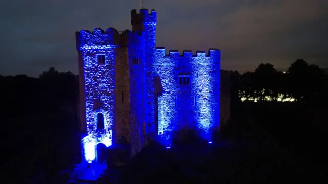 Cardiff Castle bathed in blue light