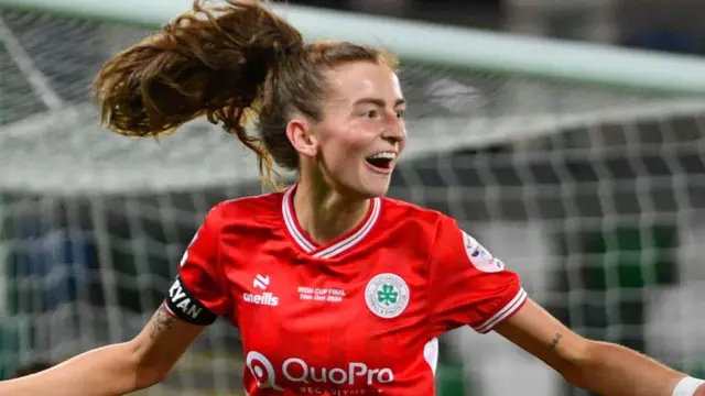 Caitlin McGuinness celebrates