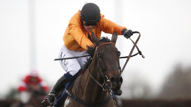 Lizzie Kelly on her way to winning the Kauto Star Novice Chase at Kempton