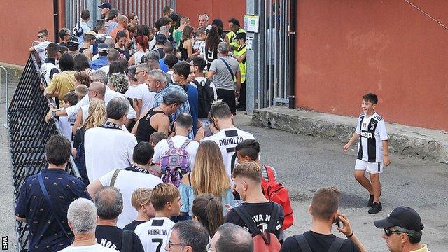 There were long queues to get into the ground at Villar Perosa before kick-off