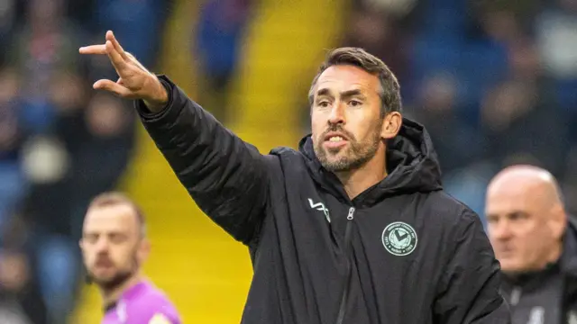 Christian Fuchs directs his Newport County team from the sidelines