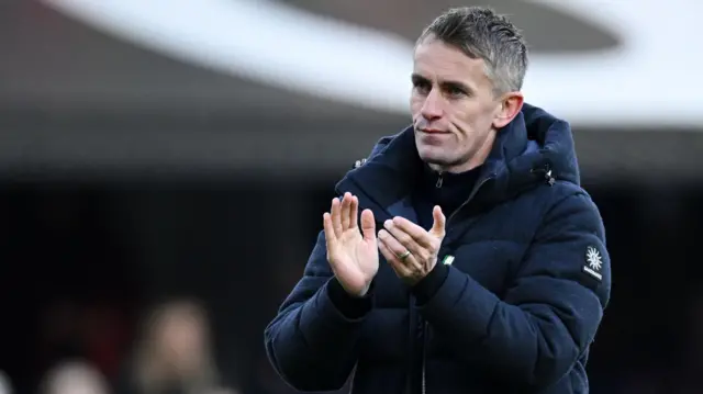 Ipswich manager Kieran McKenna claps the fans