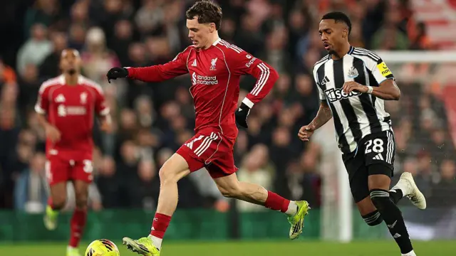 Florian Wirtz of Liverpool runs with the ball 