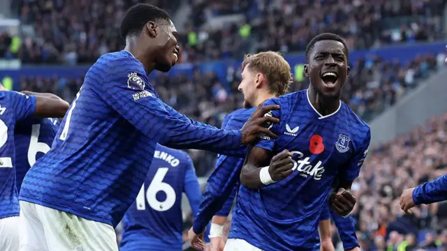 Idrissa Gueye celebrates with Thierno Barry after putting Everton ahead against Fulham in the Premier League
