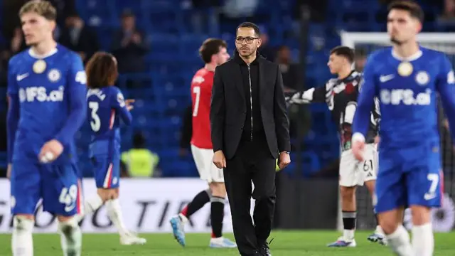 Chelsea manager Liam Rosenior looks on