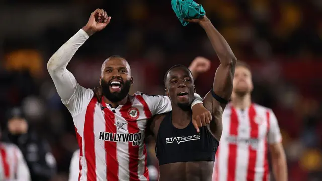  Igor Thiago and Rico Henry of Brentford celebrate following their side's victory in the Premier League match between Brentford and Liverpool 