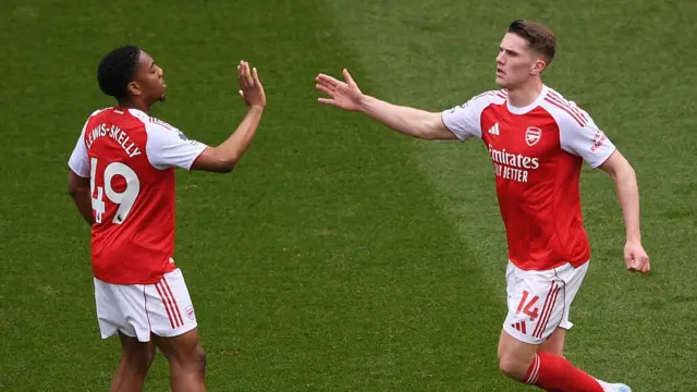 Viktor Gyokeres celebrates with teammate Myles Lewis-Skelly