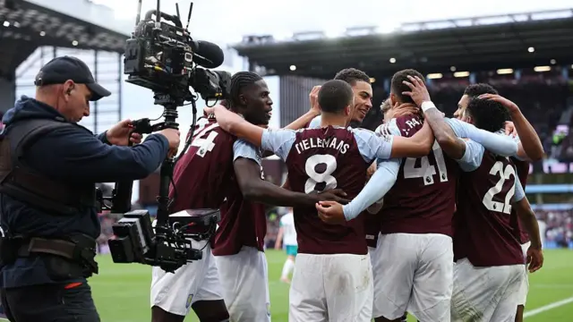 Aston Villa players celebrate