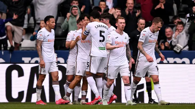 Swansea players celebrate against Middlesbrough