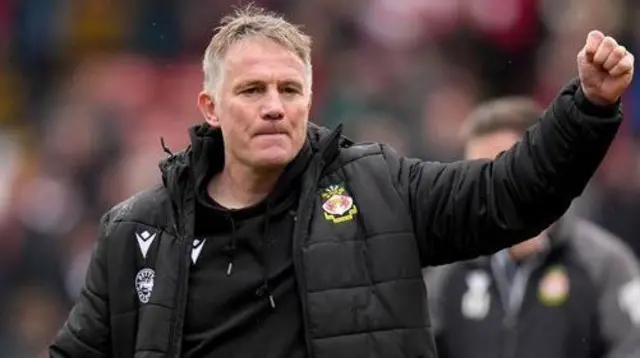 Wrexham manager Phil Parkinson punches the air