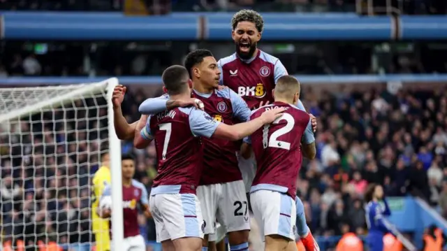 Aston Villa players celebrate