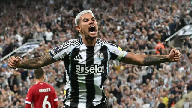 Bruno Guimaraes celebrates
