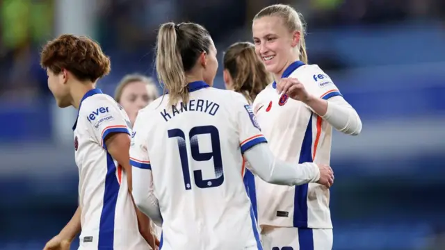 Aggie Beever-Jones celebrates scoring a goal with her team-mates