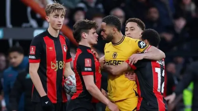 Matheus Cunha squares up to Milos Kerkez during Bournemouth's FA Cup fifth-round tie at home to Wolves