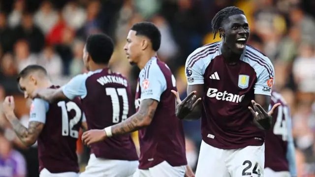 Amadou Onana of Aston Villa celebrates