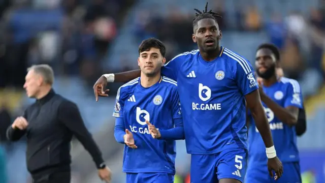 Facundo Buonanotte and Caleb Okoli of Leicester City celebrate victory