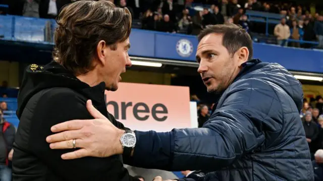 Thomas Frank shakes hands with Frank Lampard