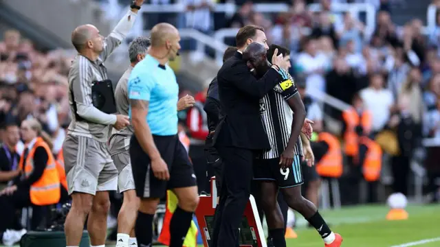 Yoanne Wissa and Matthias Jaissle embrace