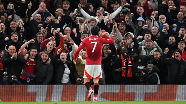 Mason Mount celebrates in front of fans