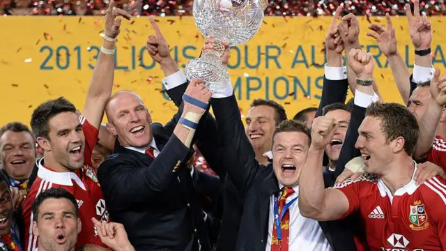 Lions players lift the Tom Richards Cup