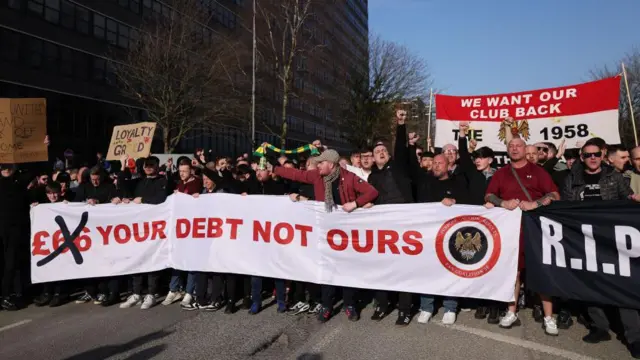 Manchester United supporters protest against their ownership and ticket prices