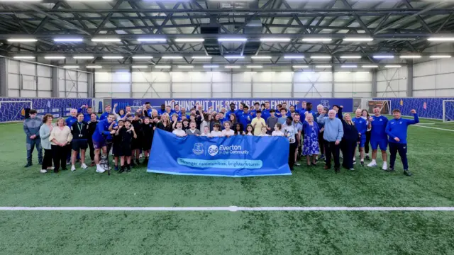 Everton players and staff with Everton In The Community 