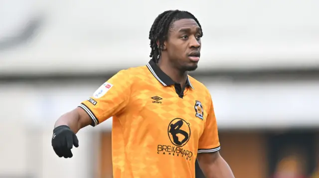 Dan Nlundulu in action for Cambridge United