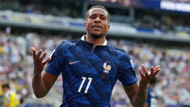 Michael Olise celebrating