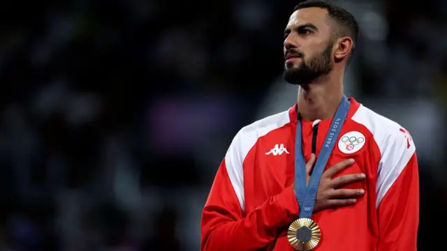 Firas Katoussi with gold medal