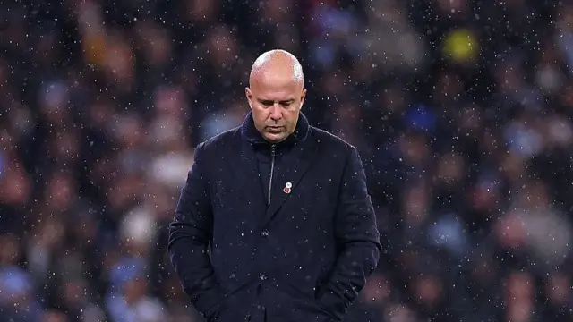 Arne Slot looking down 