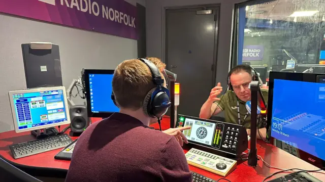 Joe Dean and Chris Reeve in The Scrimmage studio