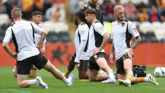 Hull City players warming up 