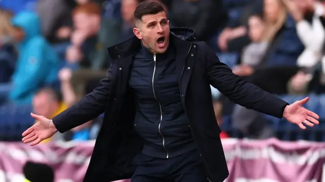 Portsmouth boss John Mousinho looks angry during the 2-1 defeat at Preston