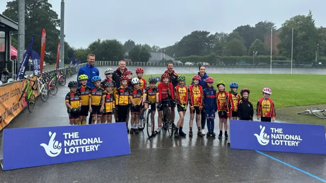 Towy Riders youngsters with Olympians Ed Clany and Dani Rowe at Carmarthen Velodrome