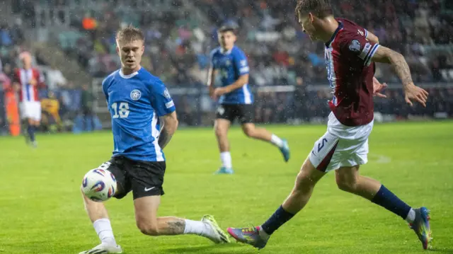 Michael Schjonning-Larsen (left) in action for Estonia