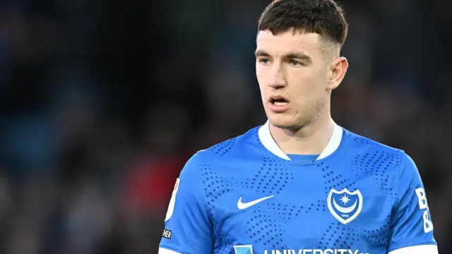 Makenzie Kirk in action for Portsmouth in their blue home jersey