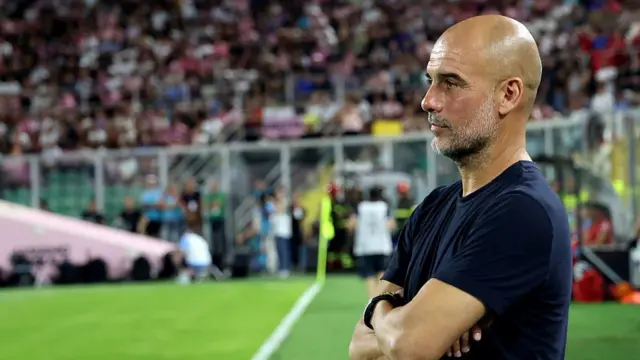 Pep Guardiola looks on during the pre-season friendly match between Palermo FC and Manchester City