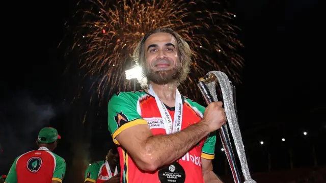 Veteran spinner Imran Tahir with the Global Super League trophy