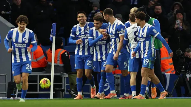 Yasin Ayari celebrates with Brighton team-mates