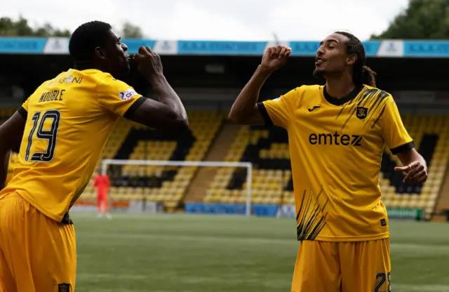 Livingston's Joel Nouble and Kurtis Guthrie celebrate